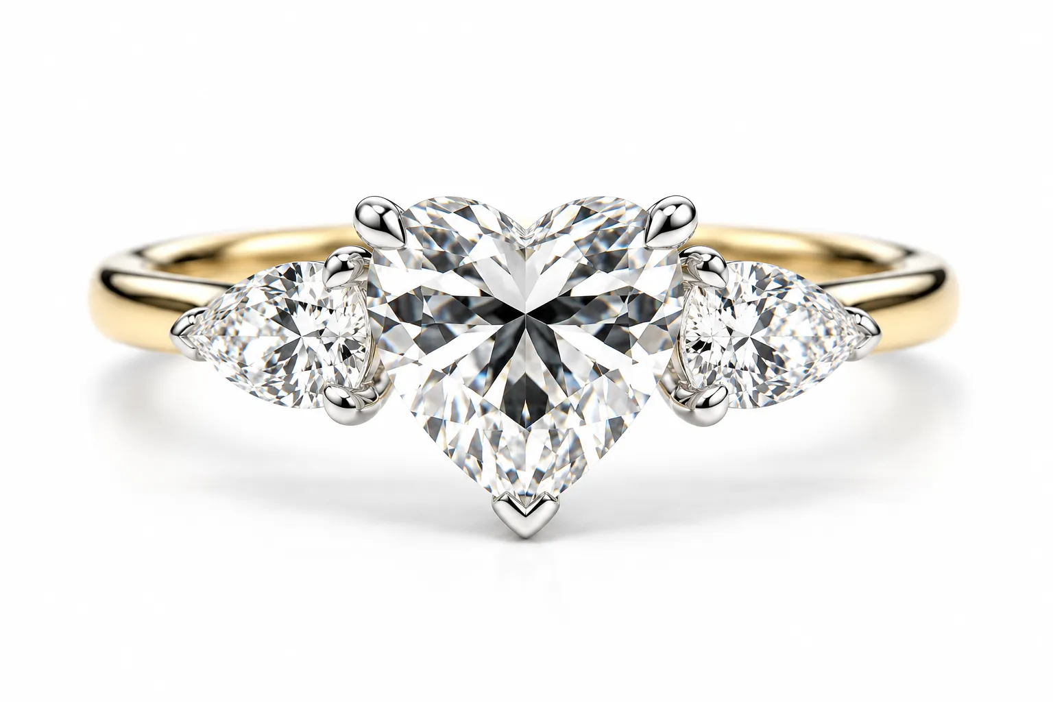 9ct Yellow Gold Heart And Pear Shape Three Stone Cubic Zirconia Ring